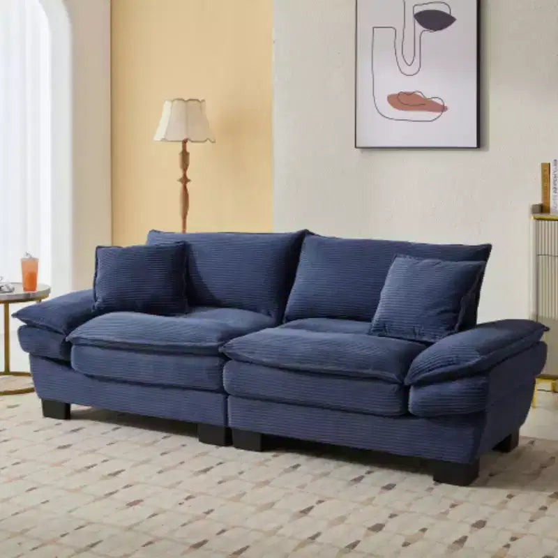 Elegante sofá de pana con asiento profundo: tamaño loveseat con almohadas y función de sofá cama