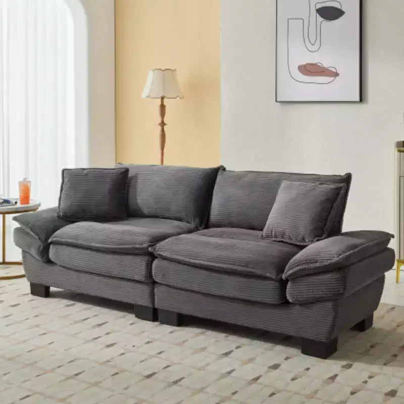Elegante sofá de pana con asiento profundo: tamaño loveseat con almohadas y función de sofá cama