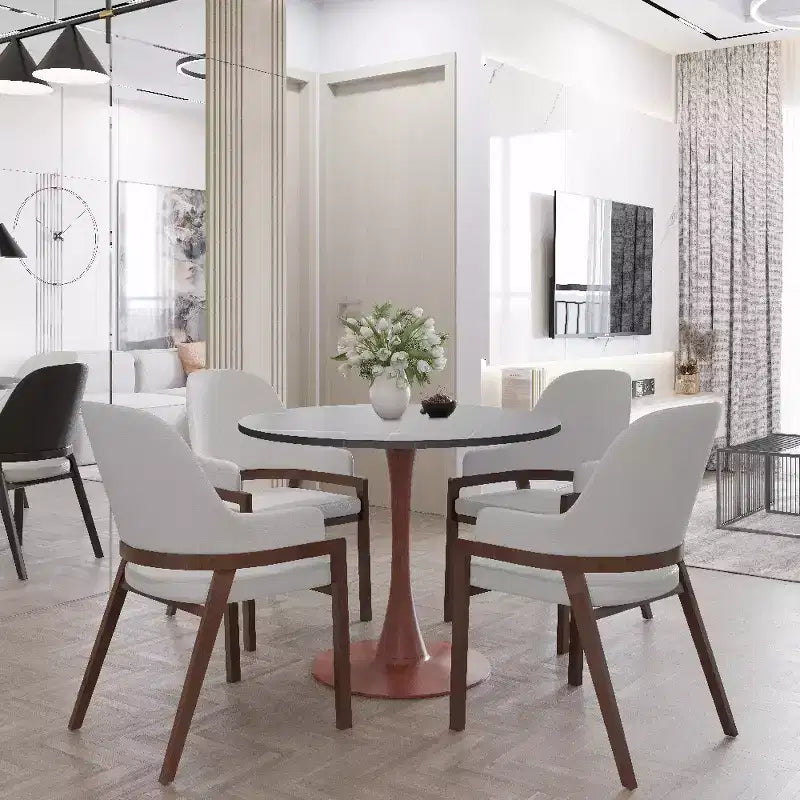 Mesa de comedor redonda LeisureMod Bristol de 27 pulgadas con cubierta de piedra sinterizada y base de pedestal de acero color cerezo para cocina y comedor modernos