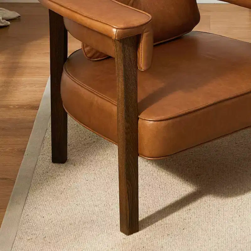 Sillón Art Leon de piel con estructura de madera de fresno