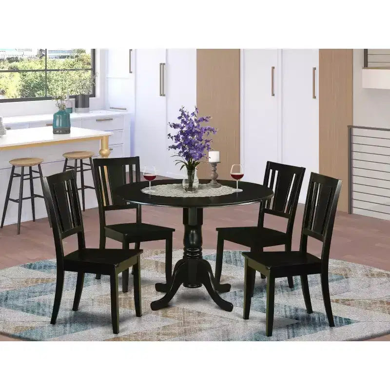 Mesa de comedor redonda HomeStock de 5 piezas con tapa de madera maciza y acabado negro, con 4 sillas