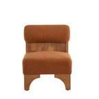 Sillón Homy Casa con respaldo enrollado y base de madera maciza, tapicería de bouclé
