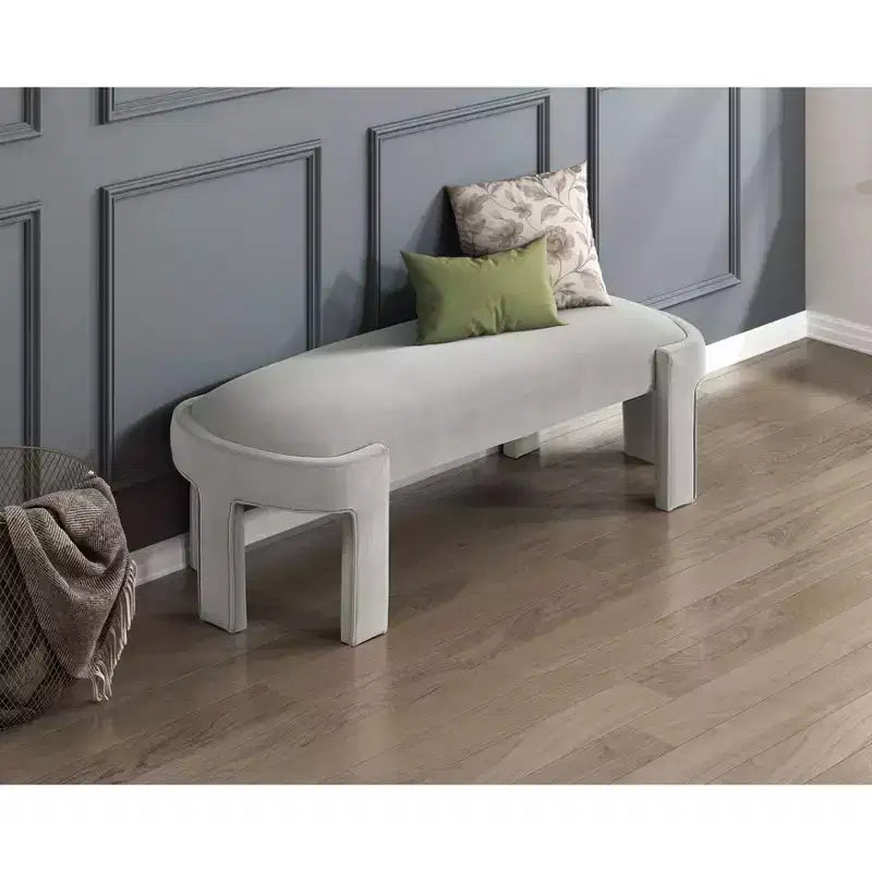 Banco tapizado de tela de terciopelo moderno y elegante Okak con estructura de madera contrachapada, otomana ovalada de lujo cómoda para dormitorio, recibidor