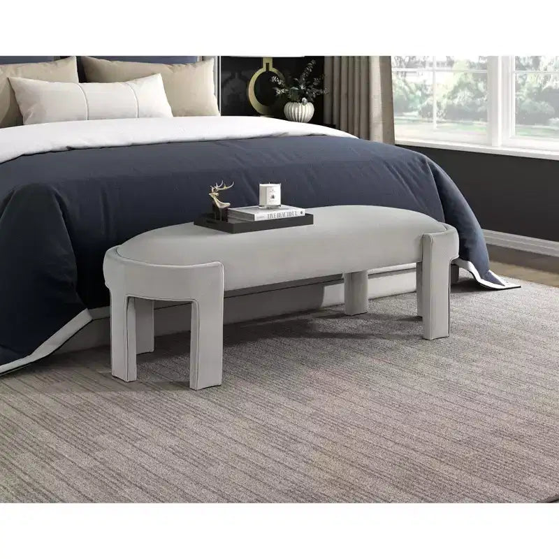 Banco tapizado de tela de terciopelo moderno y elegante Okak con estructura de madera contrachapada, otomana ovalada de lujo cómoda para dormitorio, recibidor