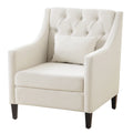 Sillón decorativo tapizado en beige con botones y cojín lumbar