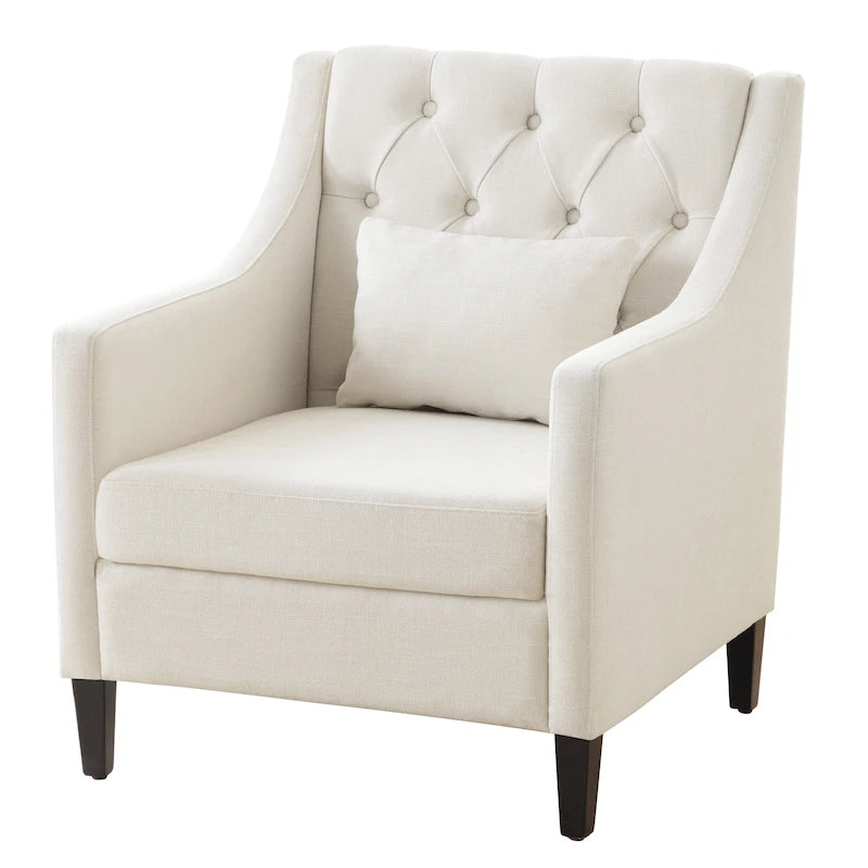 Sillón decorativo tapizado en beige con botones y cojín lumbar