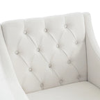 Sillón decorativo tapizado en beige con botones y cojín lumbar