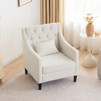 Sillón decorativo tapizado en beige con botones y cojín lumbar