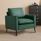Sillón decorativo tapizado en verde con cojines y almohadas
