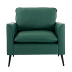Sillón decorativo tapizado en verde con cojines y almohadas