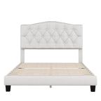 Base de cama tapizada con plataforma, cabecero curvo tipo silla de montar y detalles de rombos capitoné