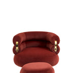 Sillón tapizado de barril color rojo vino con otomana y patas de metal