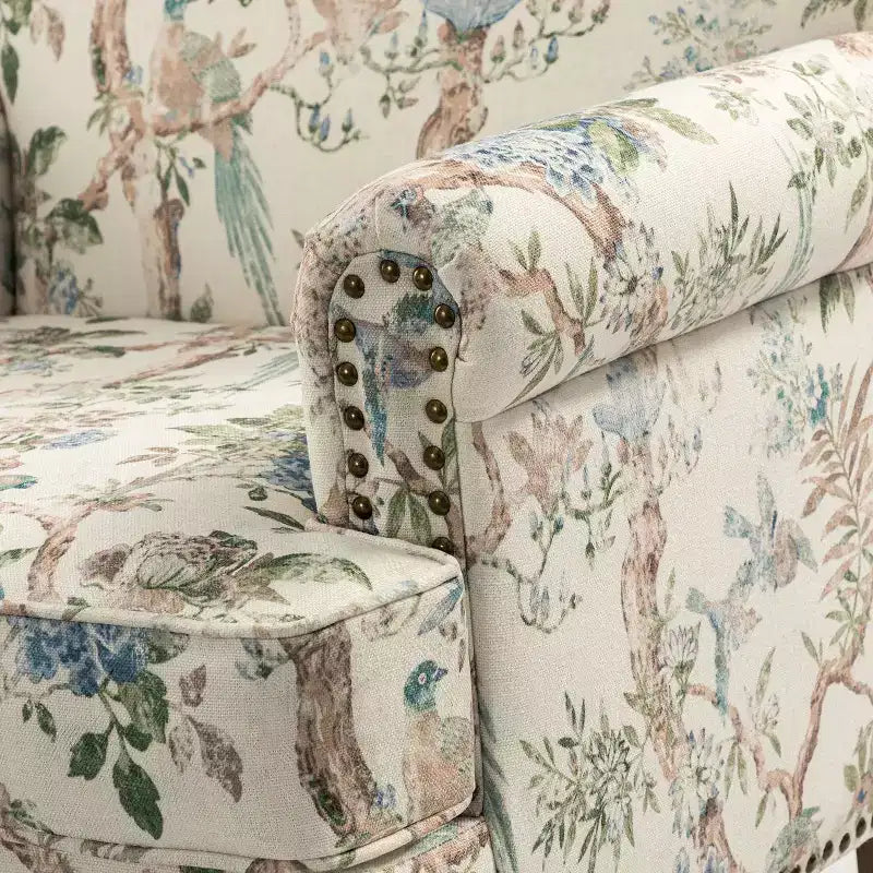 Yahweh Sillón tapizado de madera de transición con diseño de patrón floral, brazos con panel y respaldo de camello | ART OF LIVING DESIGNS